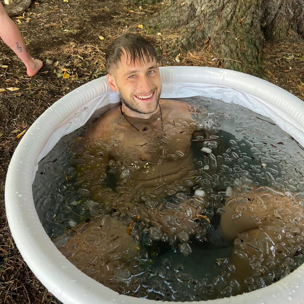 Arty taking a cold-water plunge outdoors
